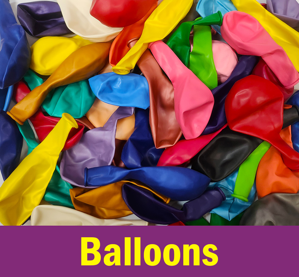 Image shows a selection of bright coloured balloons from a party shop in Carlingford, Sydney